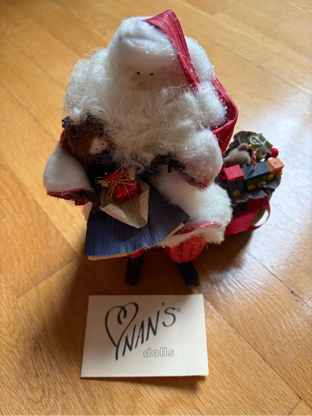 vintage nan’s cornhusk doll santa with child on lap